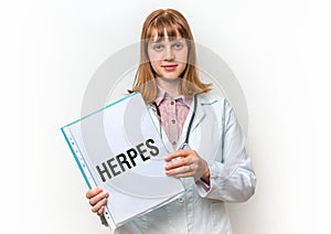 Female doctor showing clipboard with written text: Herpes