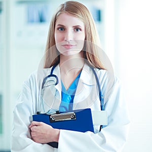 Female doctor showing x-ray at hospital