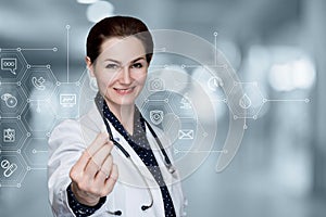 Female doctor shows medicine in pill form