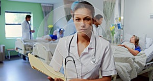 Female doctor standing in the ward at hospital 4k