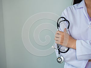 A female doctor standing on white copy space background Healthcare and medical concept.