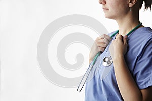 Female doctor with stethoscope cropped studio shot