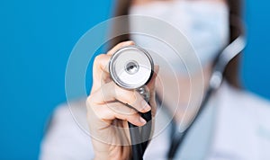 Female Doctor with stethoscope in hand