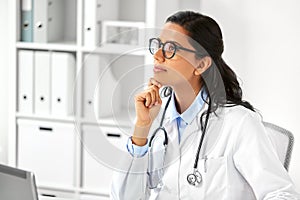 Female doctor with stethoscope at hospital