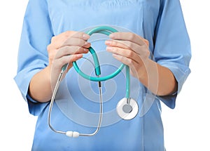 Female doctor with stethoscope on white background, closeup.