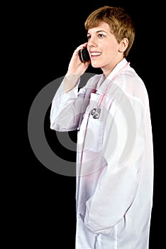 Female doctor talking on a cell phone