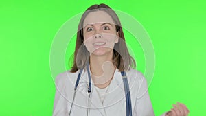 Female Doctor Talking on Online Video Call on Green Background