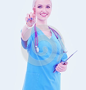 Female doctor using a digital tablet and standing on white background. Woman doctors.