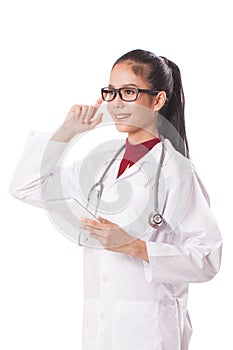 Female doctor using a digital tablet and thinking