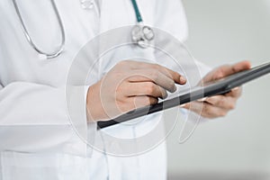 Female Doctor Using Mobile Tablet for Medical Appointment Check at Hospital, Medicine Doctor Examine Patient Health on Tablet in