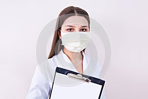 Female doctor wearing protection face mask