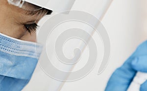 Female doctor wearing protective equipment