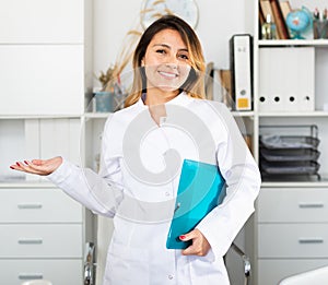 Female doctor welcoming to clinic