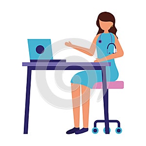 female doctor working desk laptop