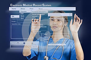Female doctor working on electronic medical record that display as holographic images
