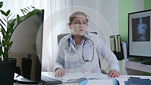 Female doctors work overtime due to illness and a pandemic at the workplace in office, sleepy nurse fell asleep from