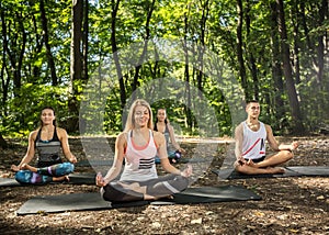 Female doing balance exercises in harmony of nature