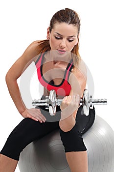 Female doing dumbbell curls