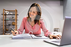 Female Doing Taxes And Accounting