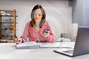 Female Doing Taxes And Accounting