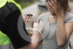 Female driver causing an accident