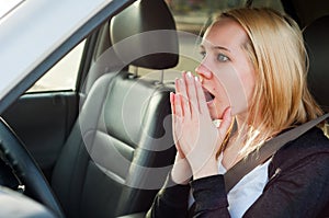 Female driver panic in a car