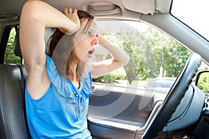 Female driver panic in a car