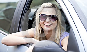 Female driver wearing sunglasses