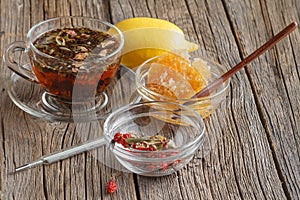 Female eat honey with herbal tea