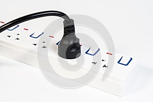 Female electrical cords plug and black male wire plug isolated on white background. White portable multiple socket outlet switch