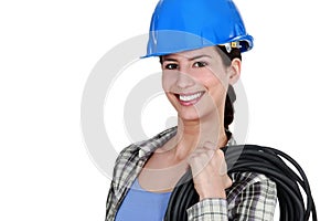 Female electrician with coil