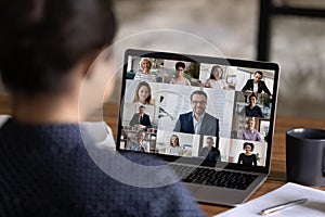 Female employee talk on video call with colleagues