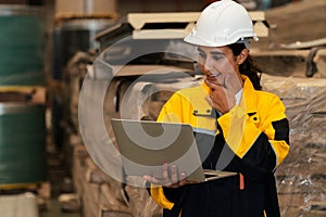 Female engineer or factory inspector conduct safety inspection. Exemplifying