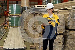 Female engineer or factory inspector conduct safety inspection. Exemplifying