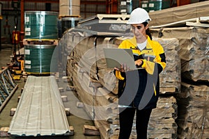 Female engineer or factory inspector conduct safety inspection. Exemplifying