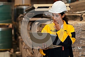 Female engineer or factory inspector conduct safety inspection. Exemplifying