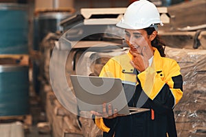 Female engineer or factory inspector conduct safety inspection. Exemplifying