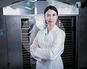 Female engineer in front of Food Dryer Dehydrator Machine