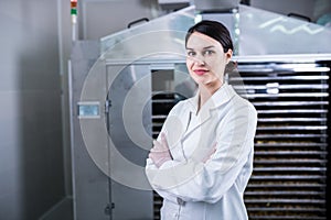 Female engineer in front of Food Dryer Dehydrator Machine