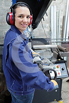 female engineer operating plant machinery