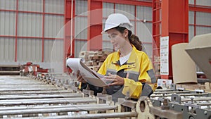 Female engineer in professional industrial factory