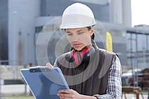 female engineer in shipping yard photo