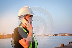 Female engineer talking on the phone photo