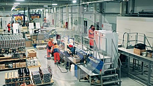 Female engineers are manufacturing fridges in the factory unit