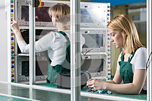 Female engineers working in factory