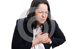 Female entrepreneur with cardiac problems touching chest