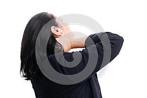 Female entrepreneur with muscular pain touching back of neck