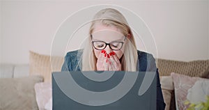 Female Entrepreneur Using Laptop In Office