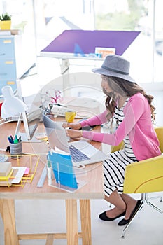 Female executive working on computer at desk