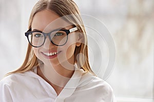 Female Eyeglasses. Portrait Of Young Woman Wearing Fashion Eyewear